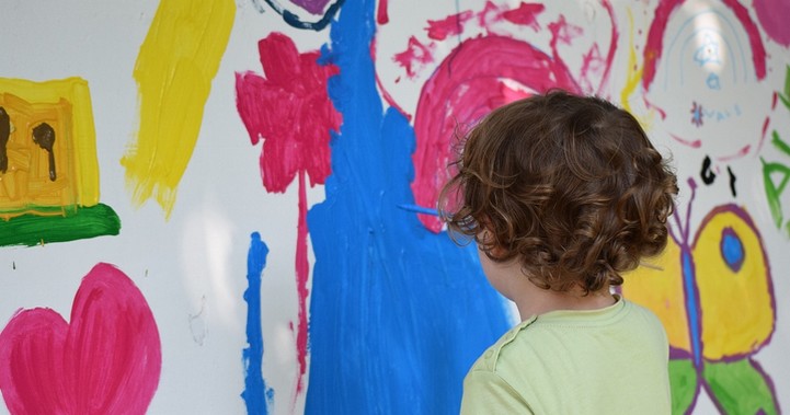 Child painting mural